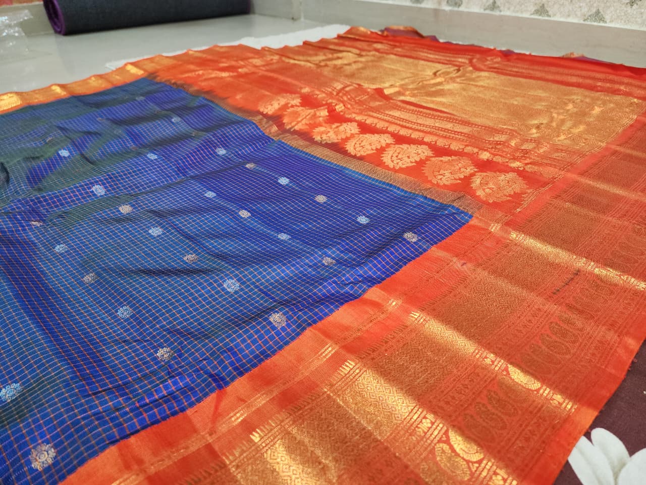 Pure Gadwal Silk Saree – Royal Blue Checks with Vermilion Orange Zari Border