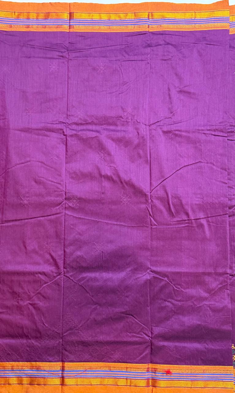 Purple kasuti saree with peacock design