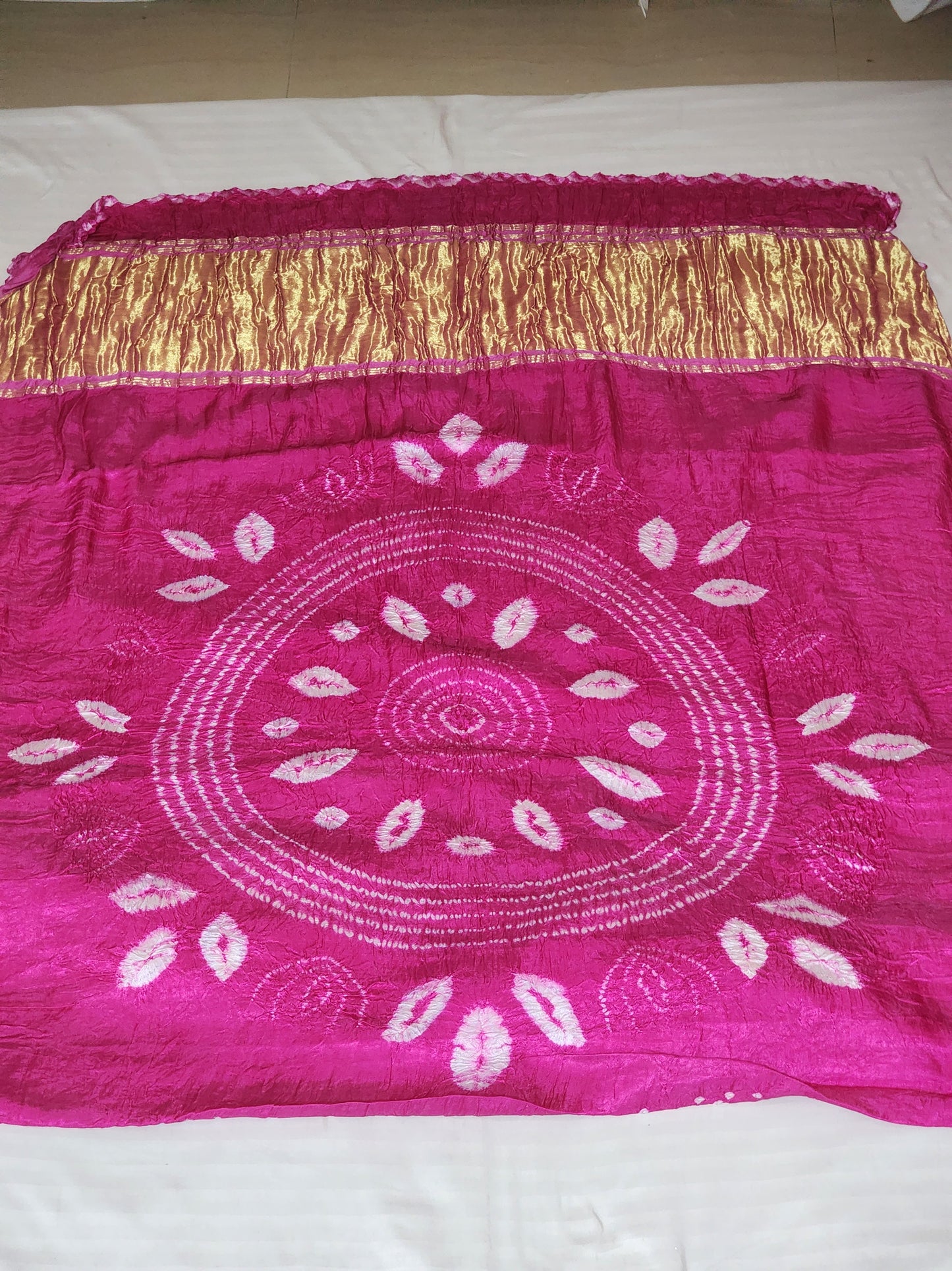 Pink Bandhani Modal Saree with Golden Panels