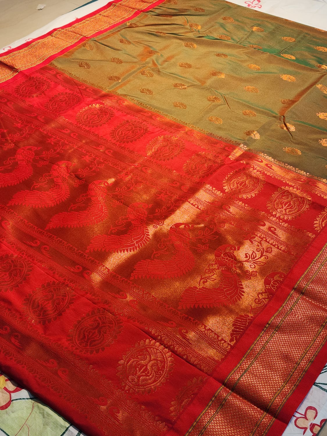 Green Paithani Saree with Red Kadiyal Border
