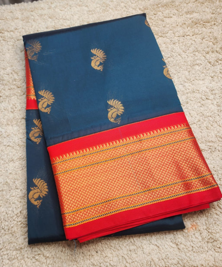 Majestic Navy Blue Paithani Saree with Red Kadiyal Border
