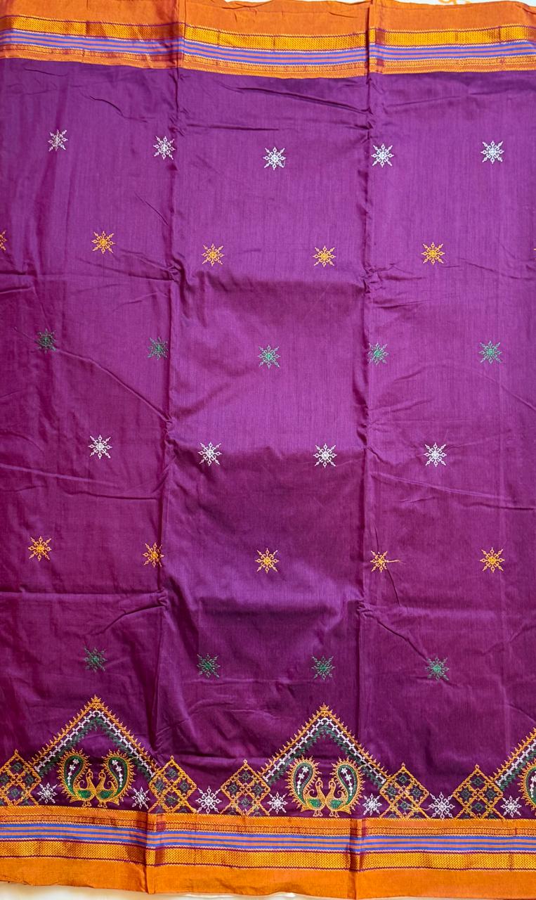 Purple kasuti saree with peacock design