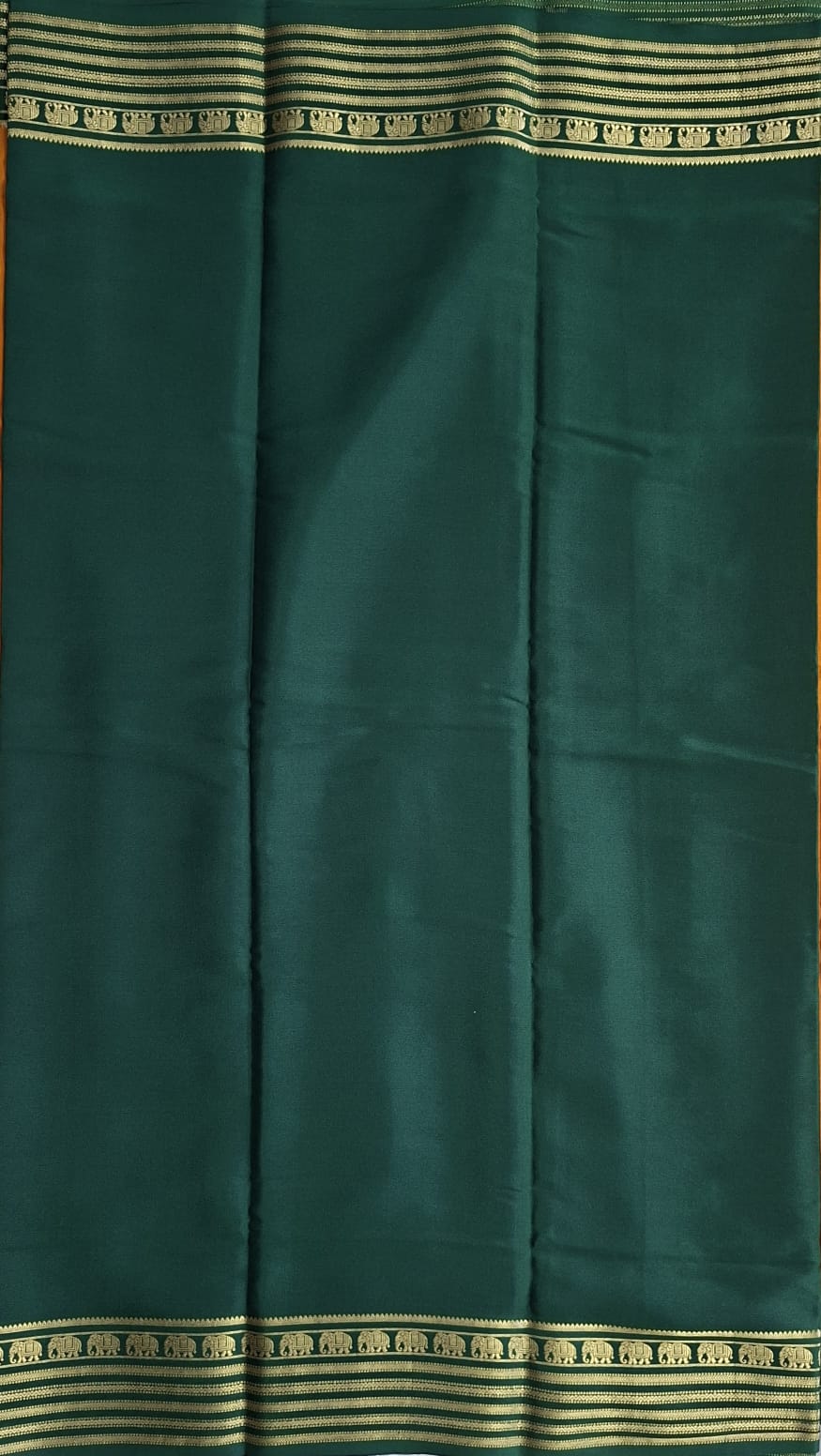 mustard-gold mysore crepe pure silk with elephant zari border