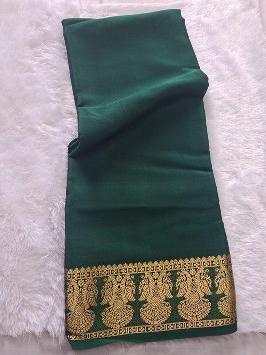 dark green mysore crepe pure silk with gandaberunda border