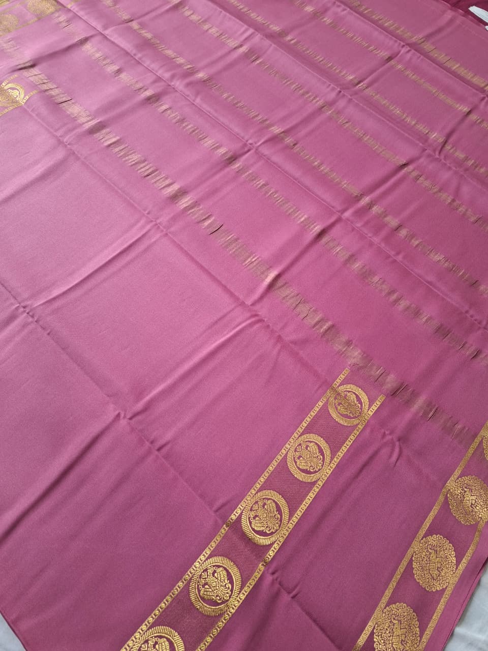 Pastel pink Mysore Crepe Silk with bentexr-gandberunda motifs border