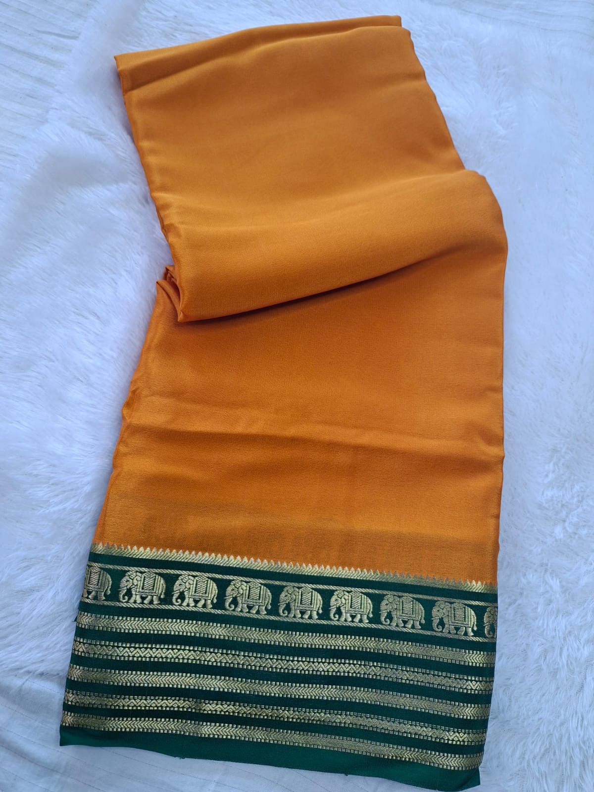 mustard-gold mysore crepe pure silk with elephant zari border