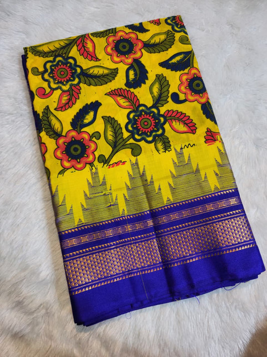 Vibrant Yellow Ilkal–Kalamkari Floral print Fusion Saree