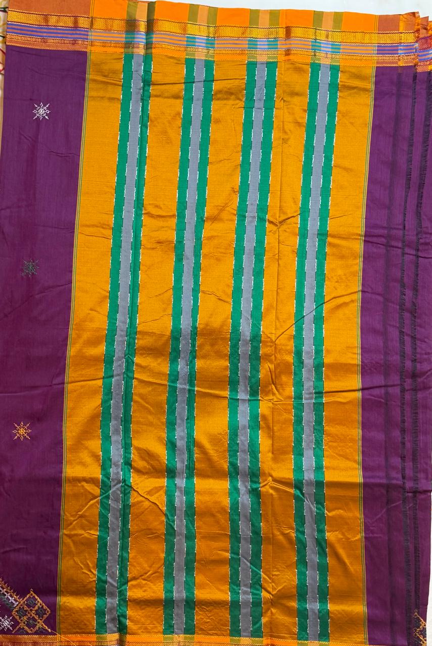 Purple kasuti saree with peacock design