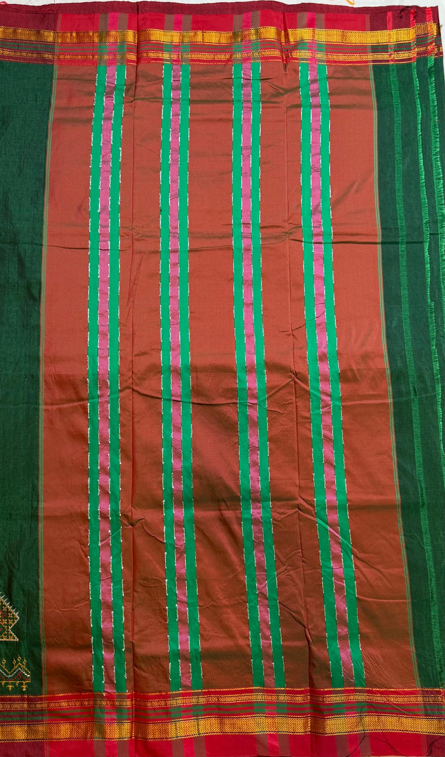 bright green kasuti saree with peacock design