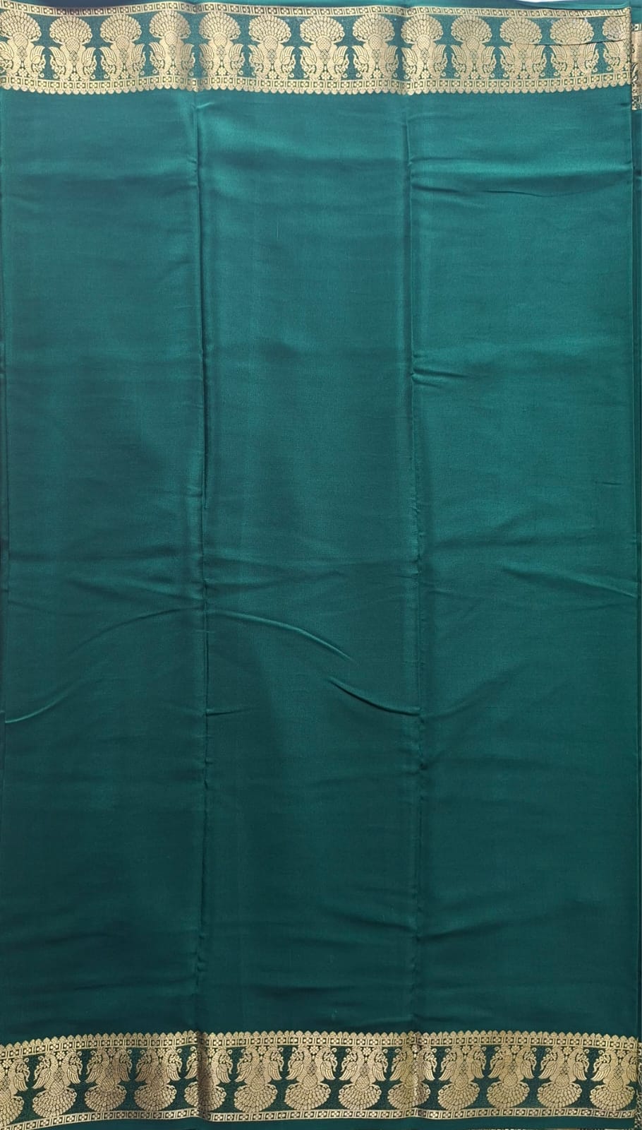 dark green mysore crepe pure silk with gandaberunda border