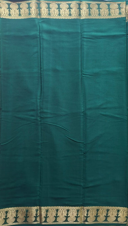 dark green mysore crepe pure silk with gandaberunda border