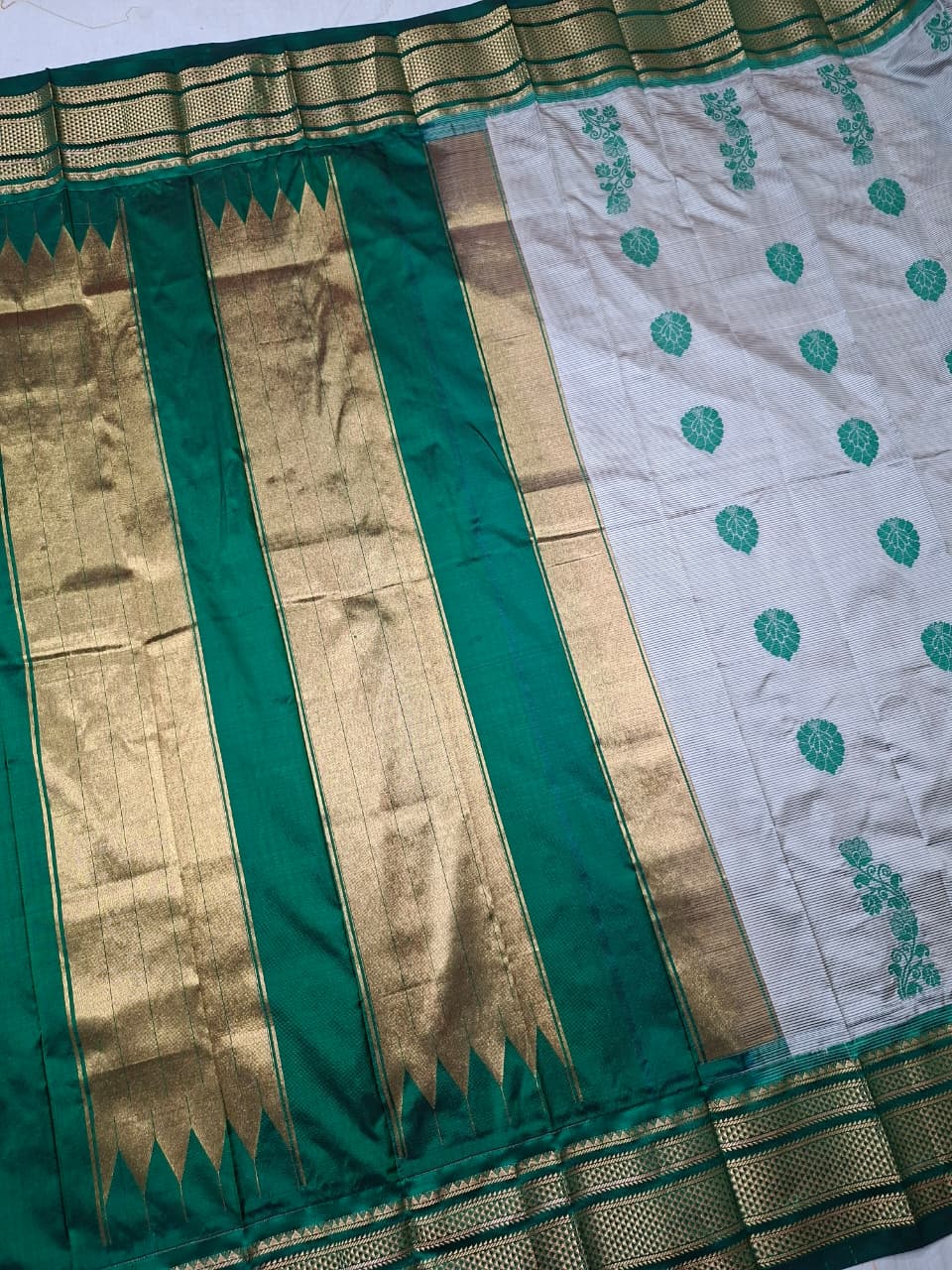 Off-white & green Ilkal Silk saree with floral weavings