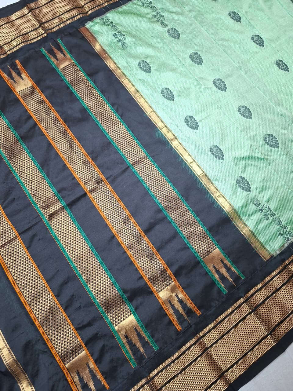 Sage/MInt green & black Ilkal saree with floral weavings