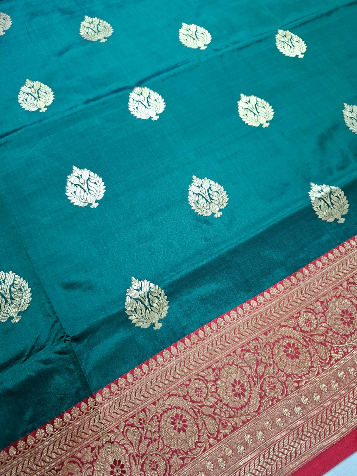 Bottle Green Banarasi Silk Saree with Golden Leaf Motifs