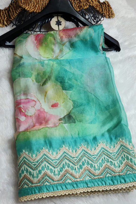 Aqua-blue-floral-organza-saree
