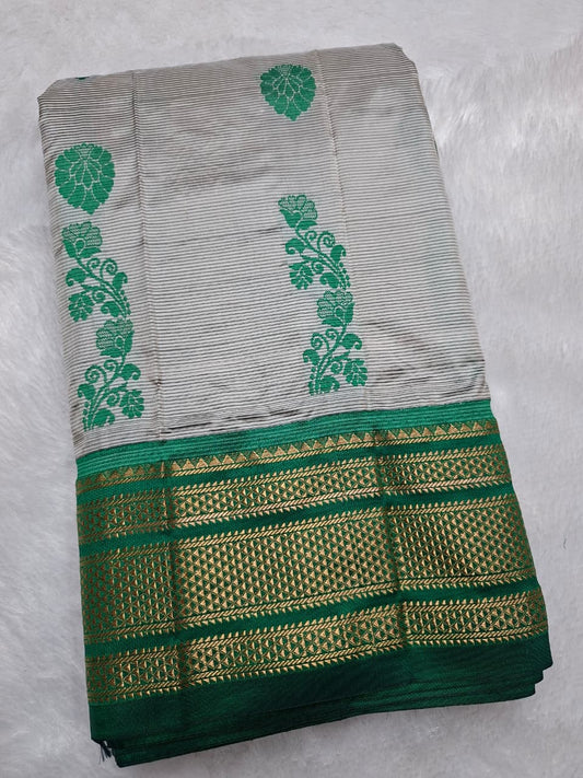 Off-white & green Ilkal Silk saree with floral weavings