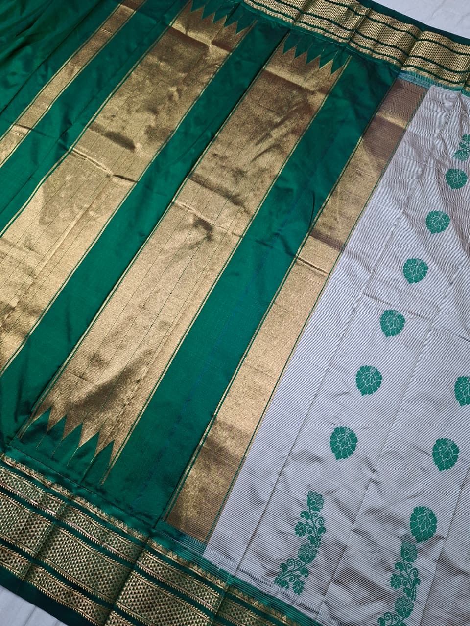 Off-white & green Ilkal Silk saree with floral weavings