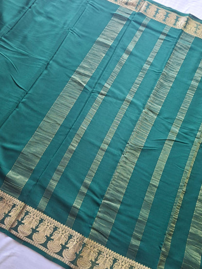 dark green mysore crepe pure silk with gandaberunda border