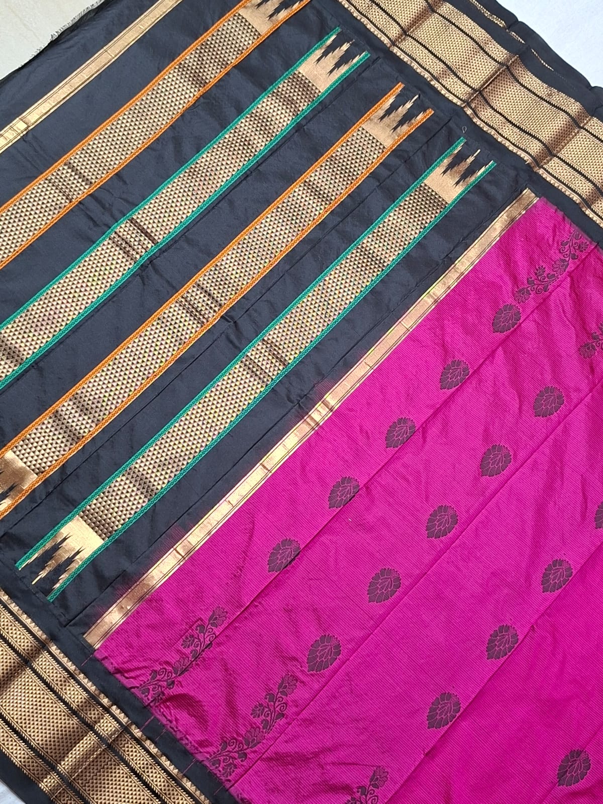 Rani pink & black Ilkal saree with with floral weavings