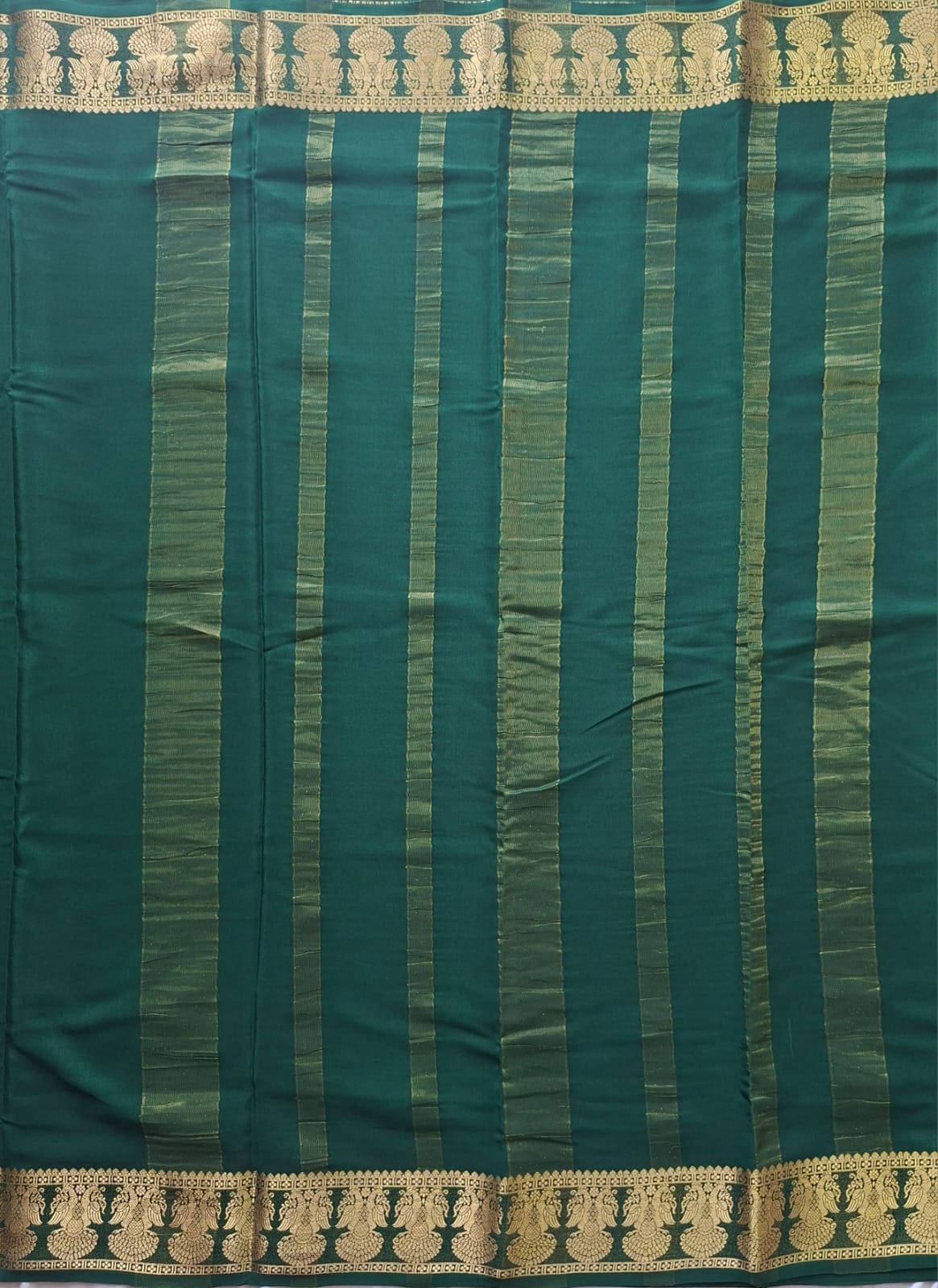 dark green mysore crepe pure silk with gandaberunda border
