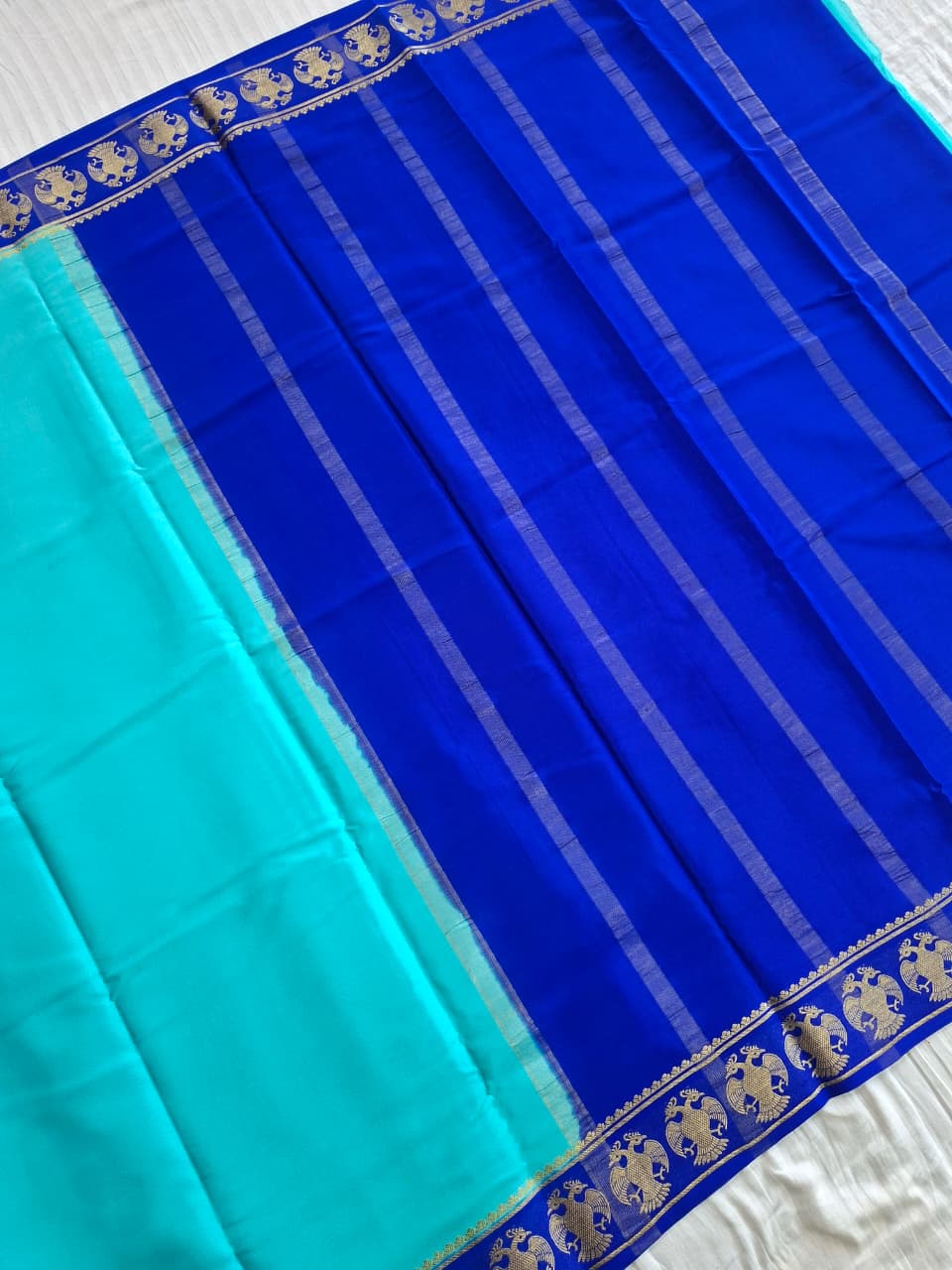 Sky Blue Mysore Crepe Silk with darke border-gandberunda motifs