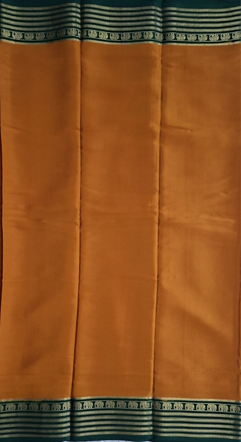mustard-gold mysore crepe pure silk with elephant zari border