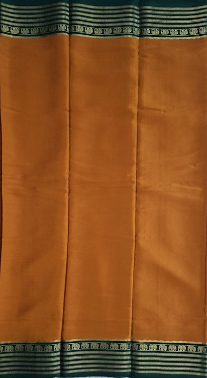 mustard-gold mysore crepe pure silk with elephant zari border