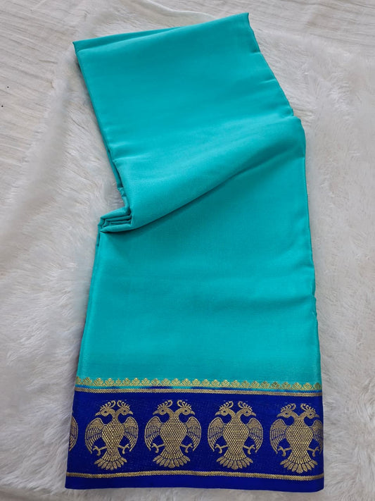 Sky Blue Mysore Crepe Silk with darke border-gandberunda motifs