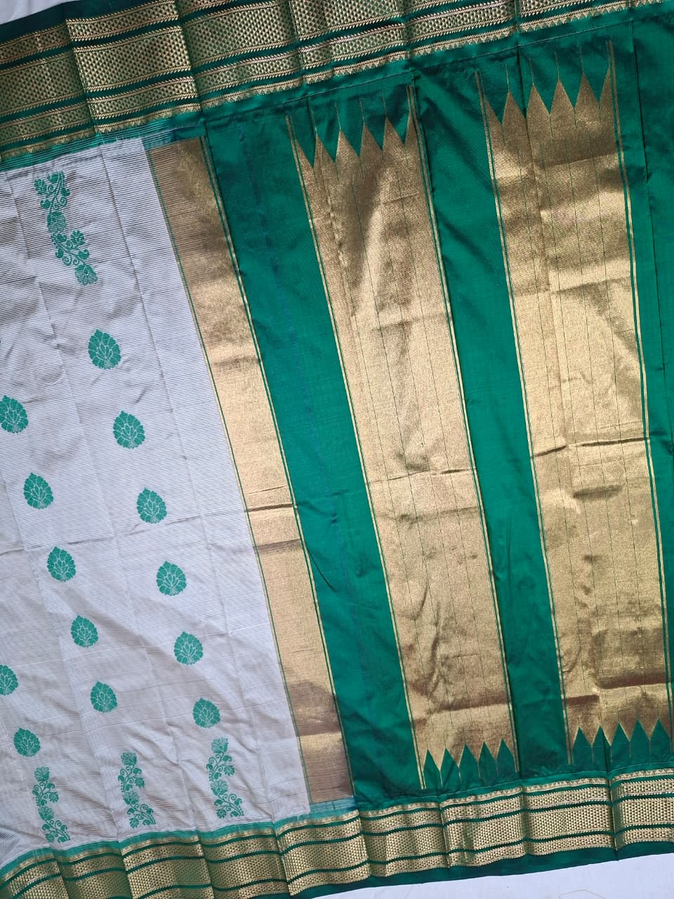 Off-white & green Ilkal Silk saree with floral weavings