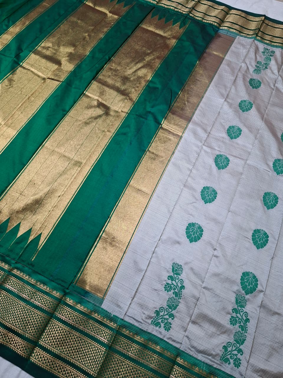 Off-white & green Ilkal Silk saree with floral weavings