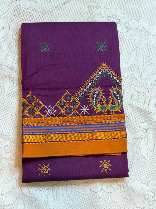 Purple kasuti saree with peacock design