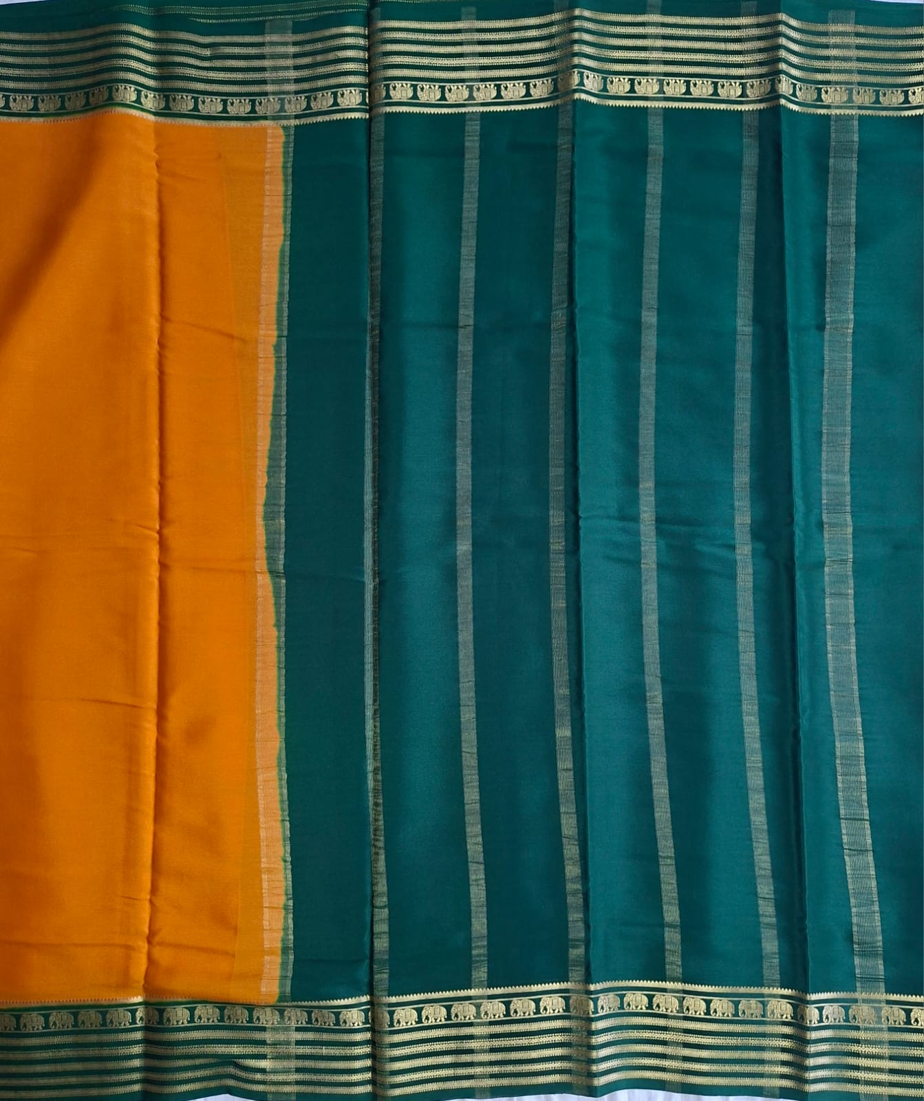 mustard-gold mysore crepe pure silk with elephant zari border