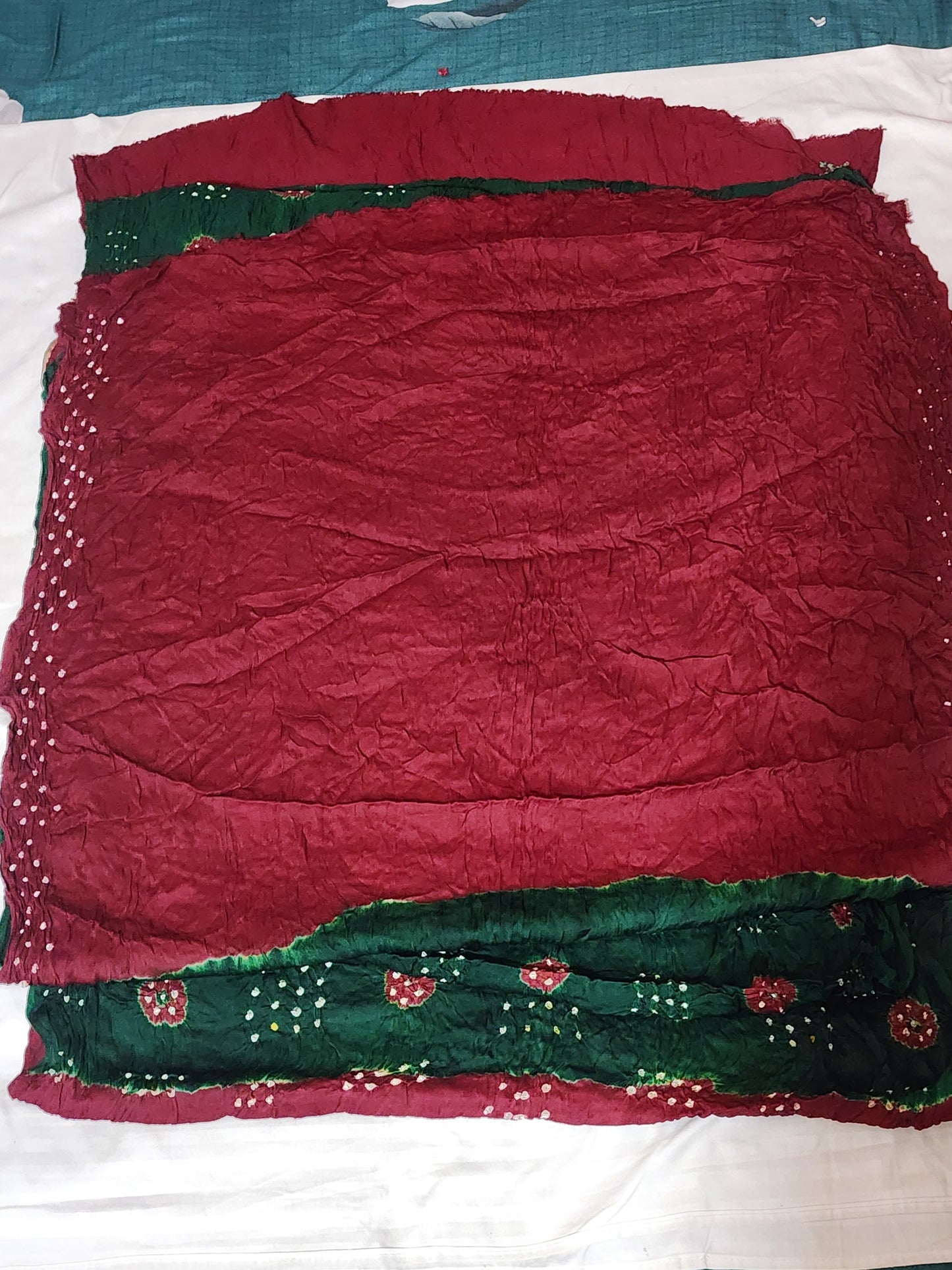 Maroon Bandhani Modal Silk Saree with Golden Panels
