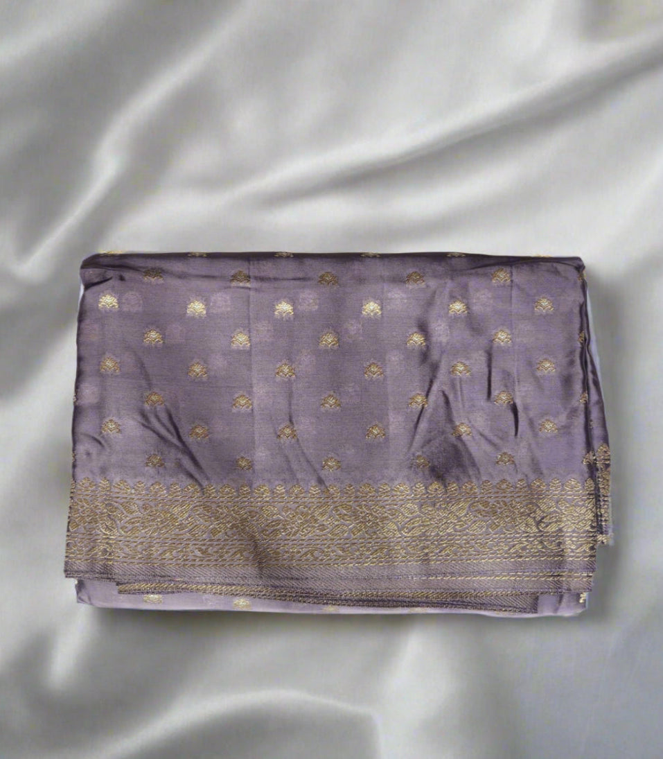 Elegant Charm – Dusty Lavender Banaras Silk Saree with Gold Zari Weaving