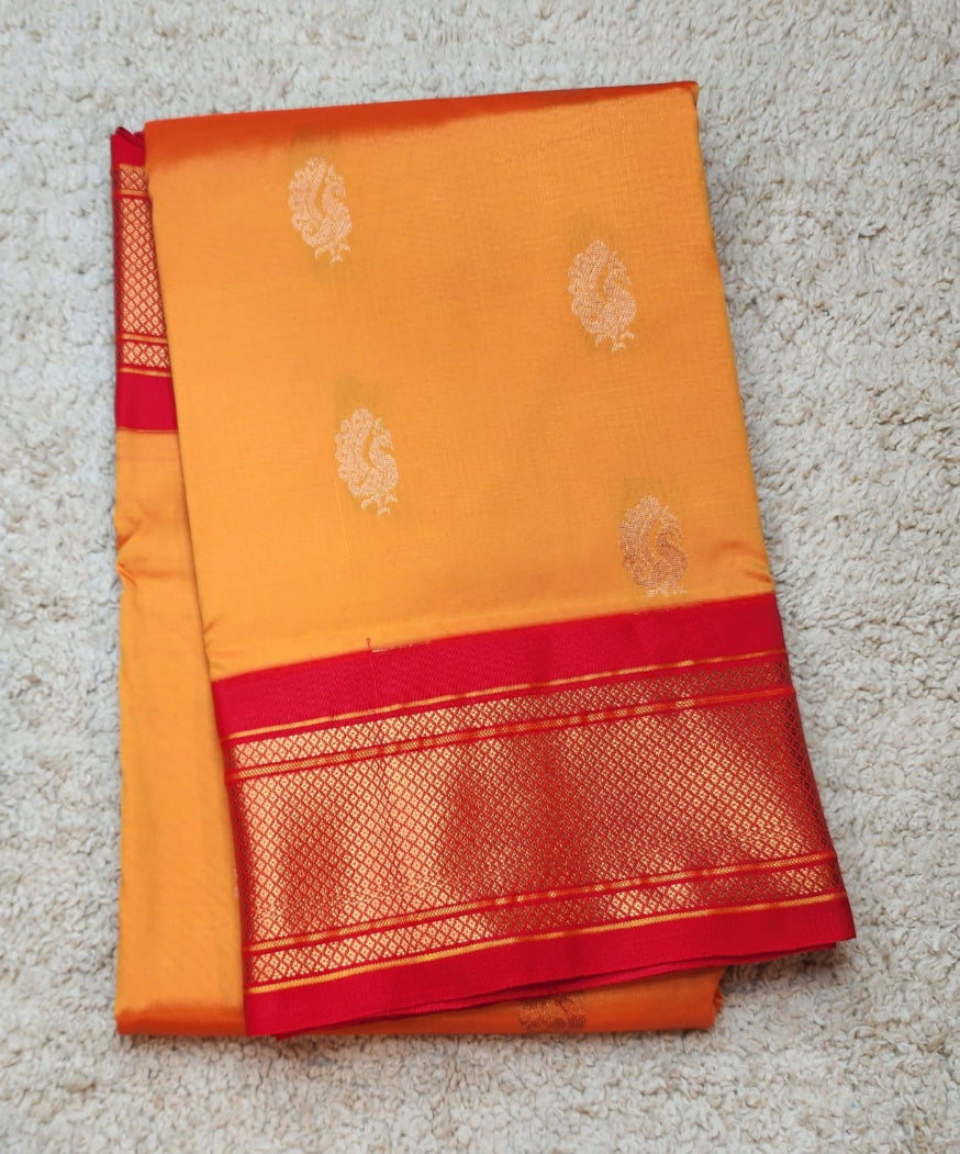 Orange Paithani Saree with Red Kadiyal Border