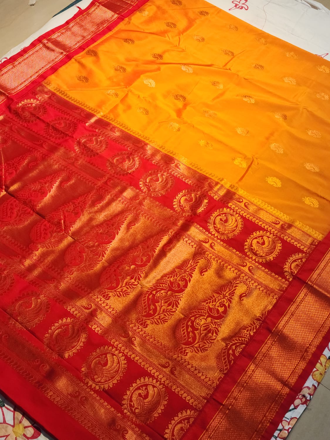 Orange Paithani Saree with Red Kadiyal Border