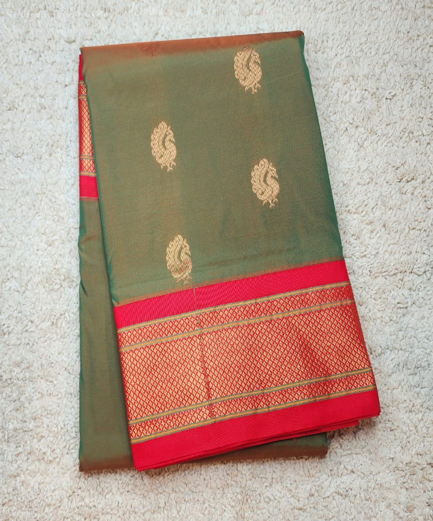 Green Paithani Saree with Red Kadiyal Border