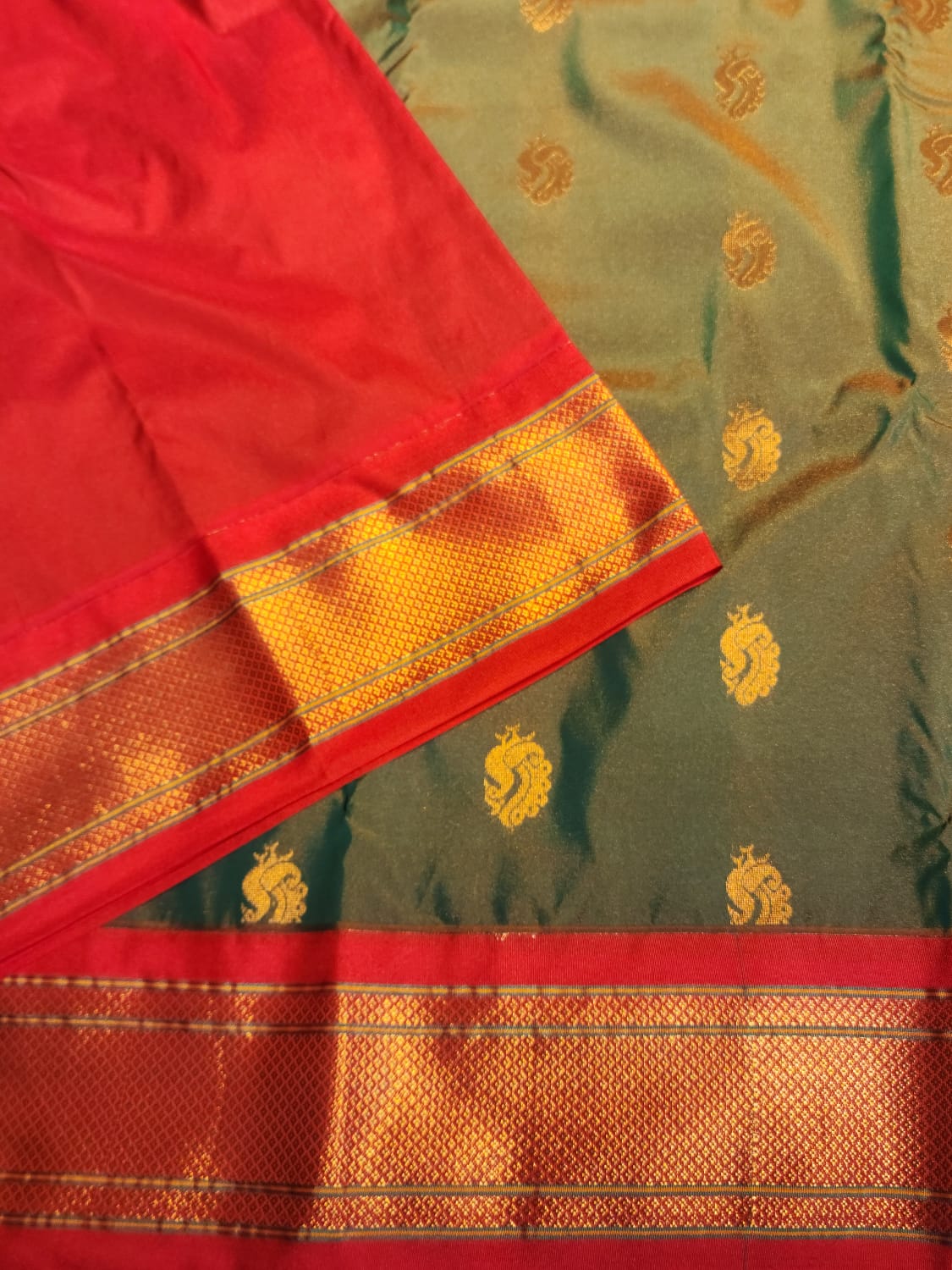 Green Paithani Saree with Red Kadiyal Border