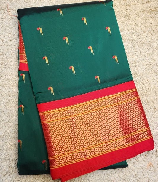 Bottle Green Paithani Saree with red Kadiyal border and muniya motif