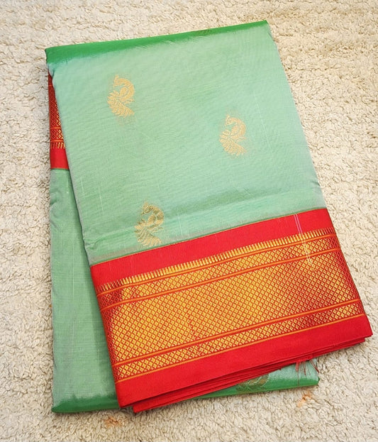 Serene Mint Green Paithani Saree with Fiery Red Kadiyal Border