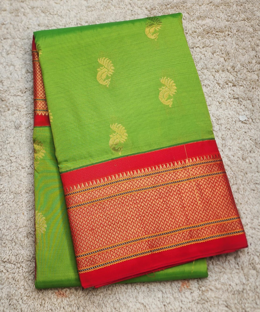 Vibrant Green Paithani Saree with Classic Red Kadiyal Border