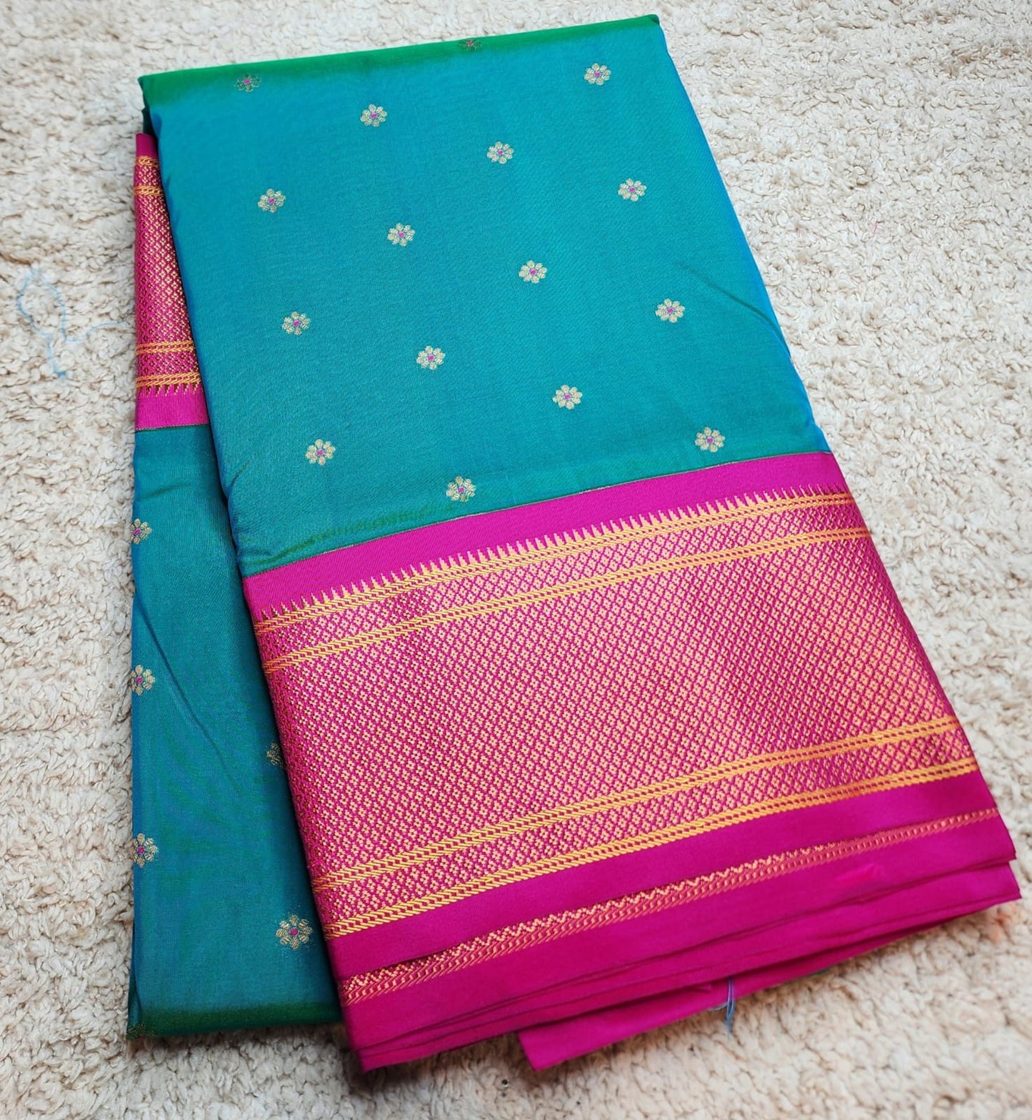 Teal Green Paithani Saree with Rani Pink Kadiyal Border & Floral meenakari Buttas