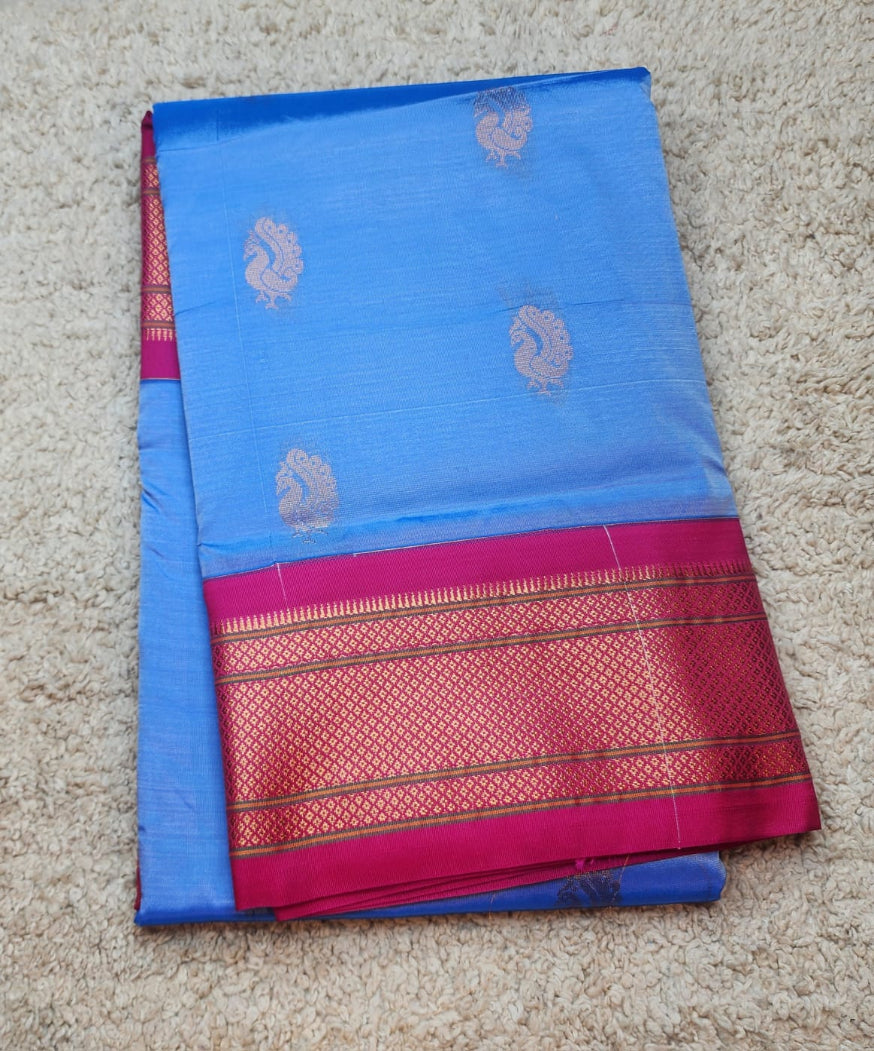 Sky Blue Paithani Saree with Contrast Pink Kadiyal Zari Border