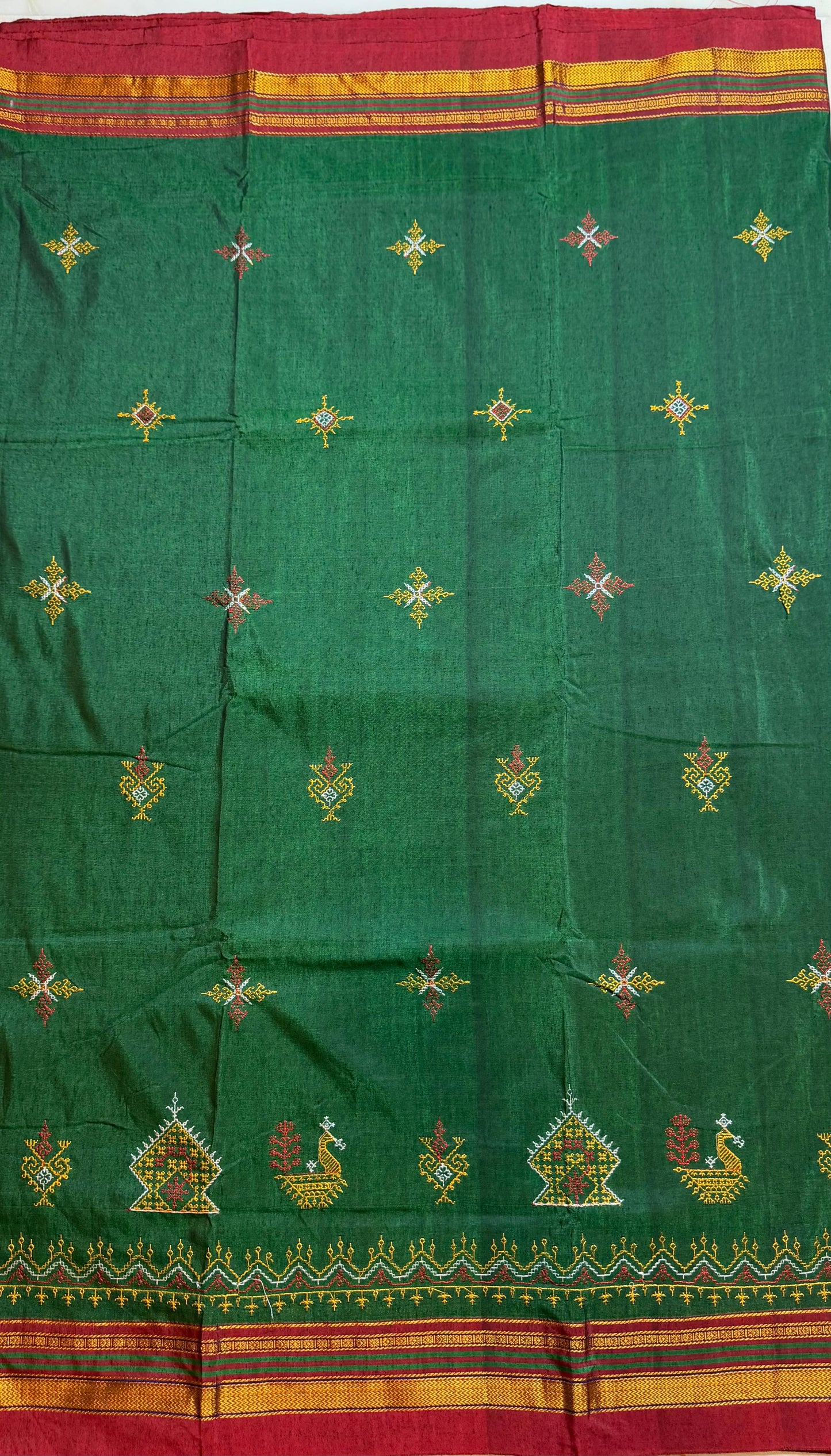 bright green kasuti saree with peacock design