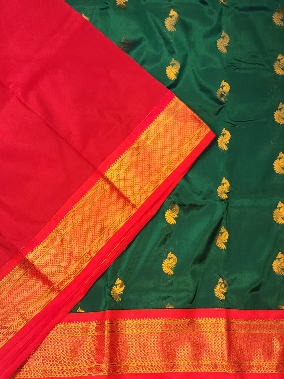 Majestic Green Paithani Saree with Rich Red Kadiyal Border
