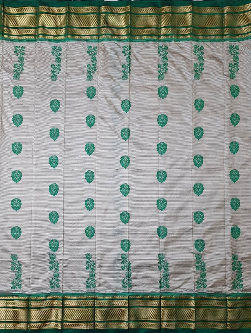 Off-white & green Ilkal Silk saree with floral weavings