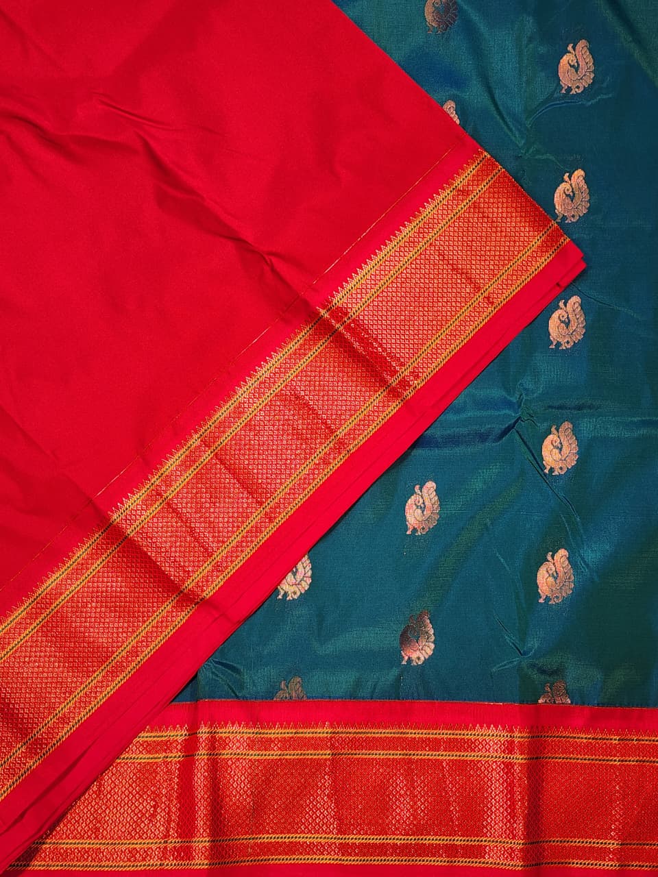Majestic Navy Blue Paithani Saree with Red Kadiyal  Border