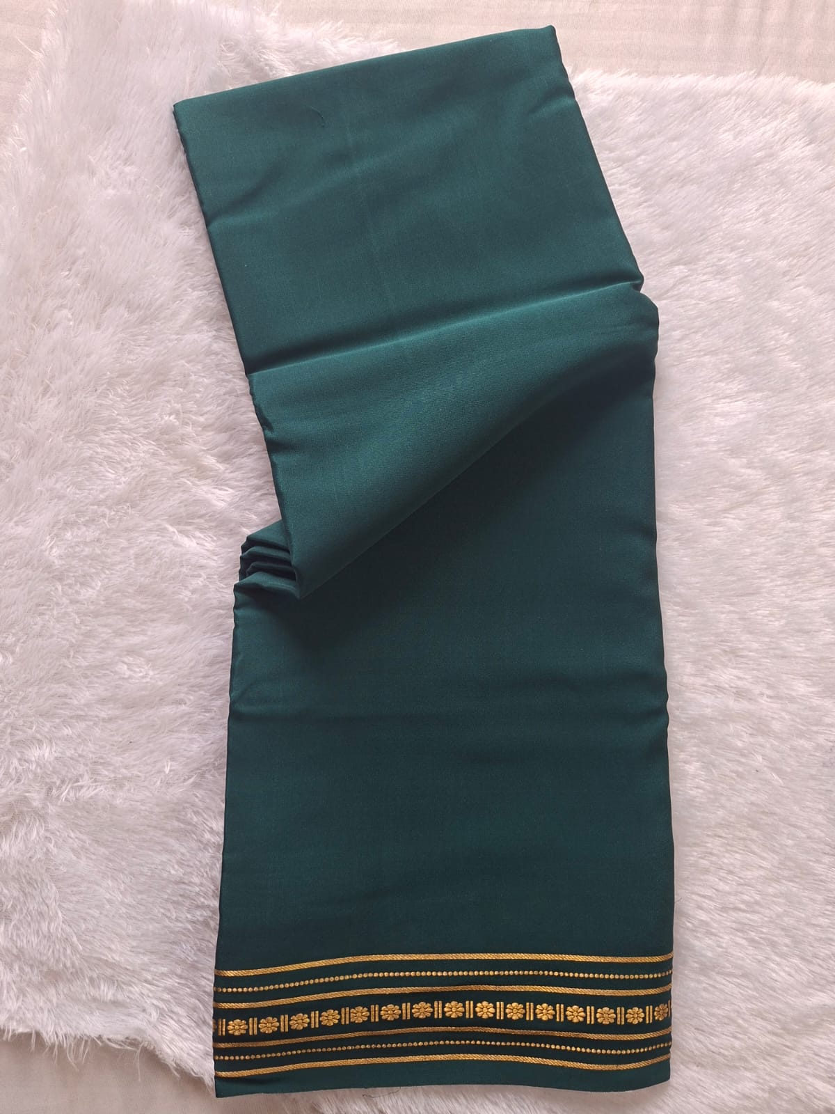 dark green mysore crepe pure silk with floral zari border