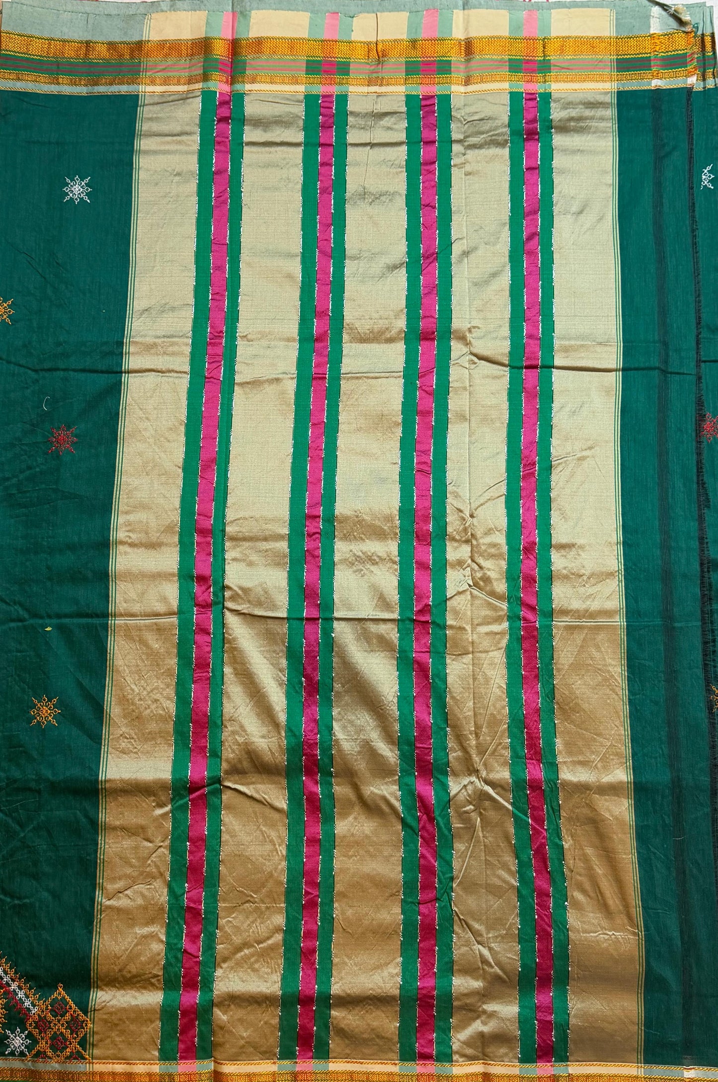 dark green kasuti saree with peacock design