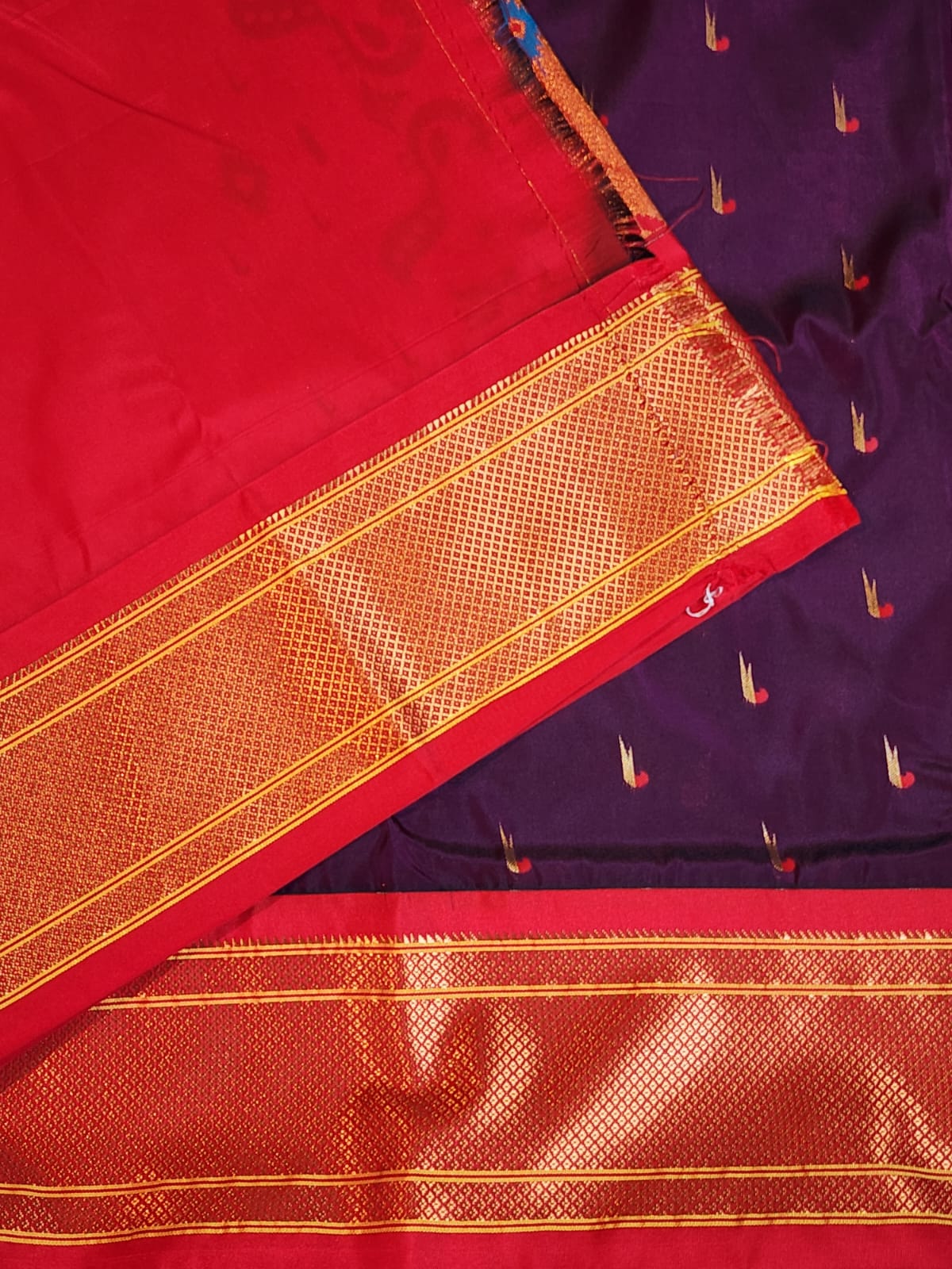 Royal Purple Paithani Saree with Red Kadiyal Border & Muniya Motifs